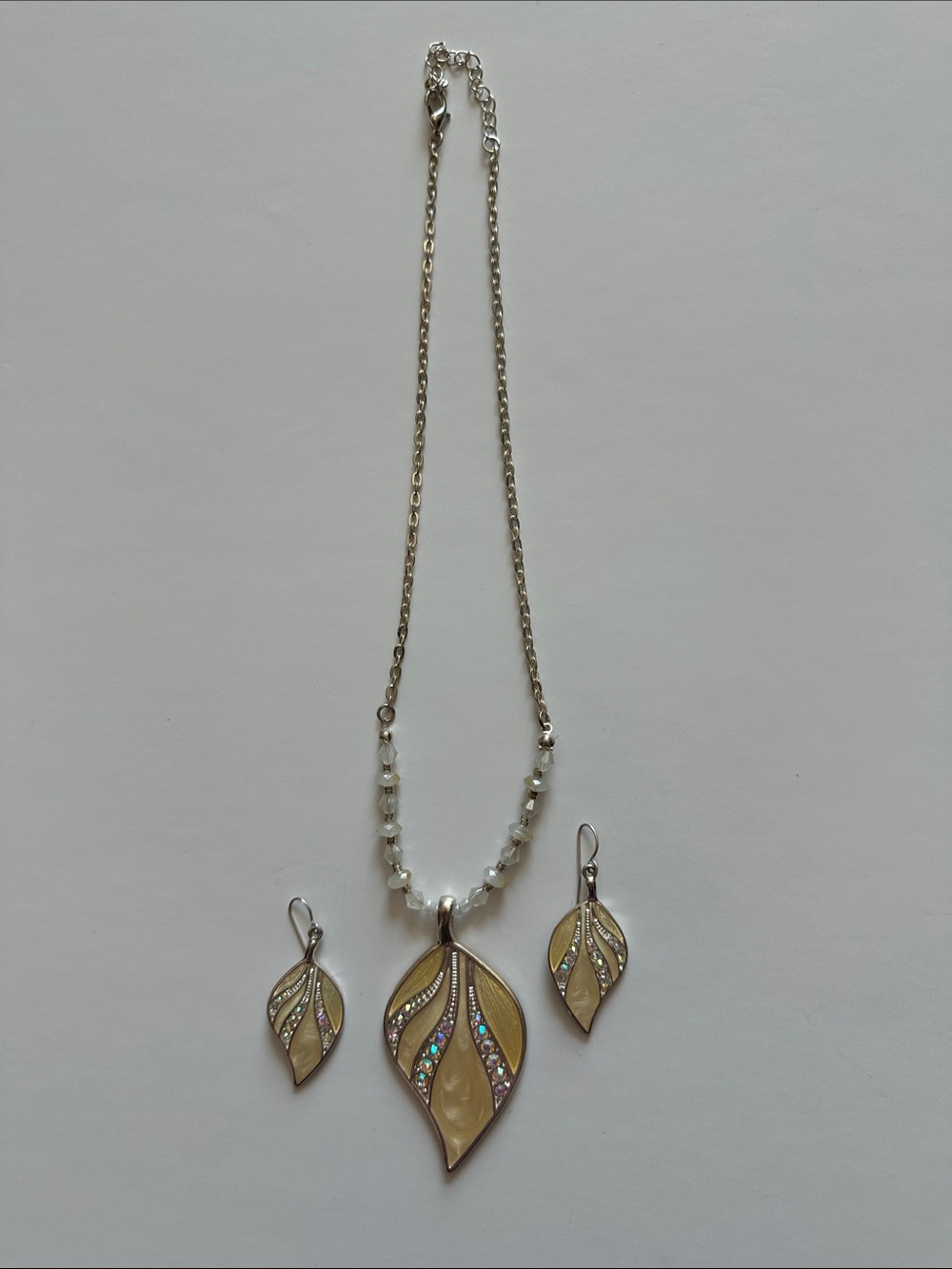 Kenneth Cole Silver Tone Leaf Necklace and Earrings with Iridescent Inlay